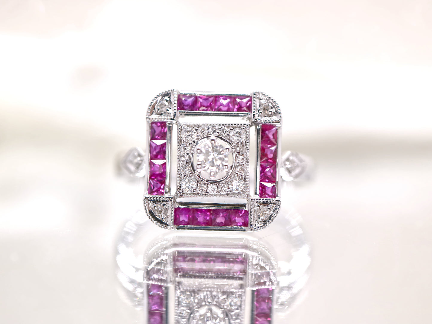 Art deco ruby ring in square channel set design