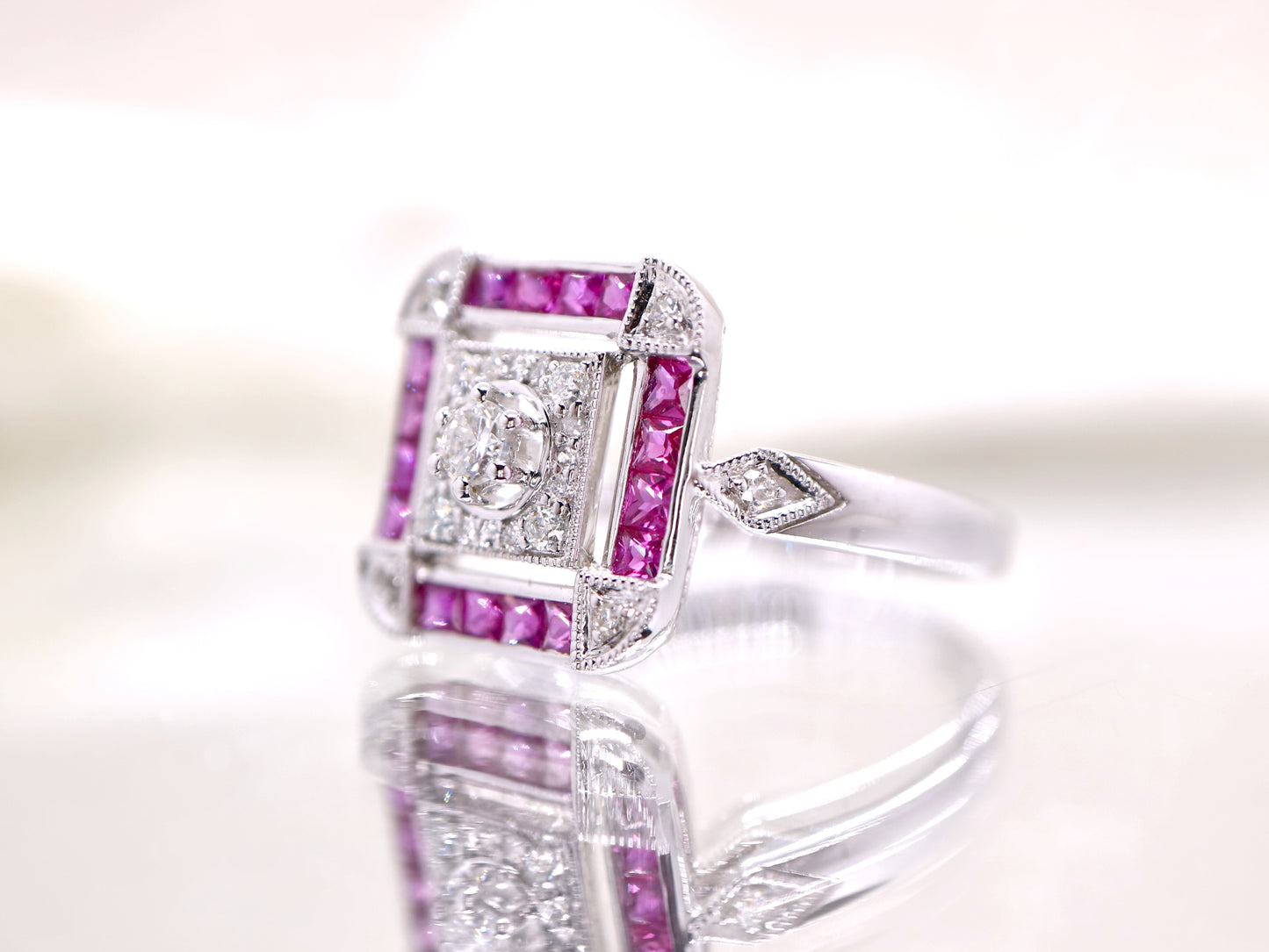 Art deco ruby ring in square channel set design