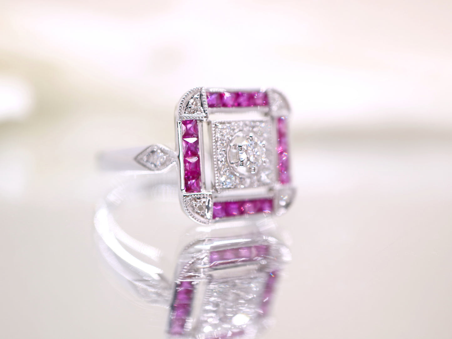 Art deco ruby ring in square channel set design