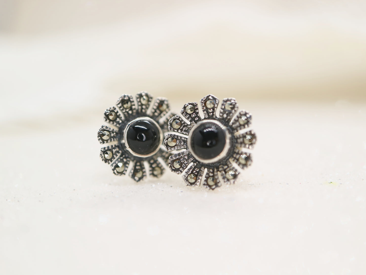 Black onyx and marcasite flower earrings in sterling silver