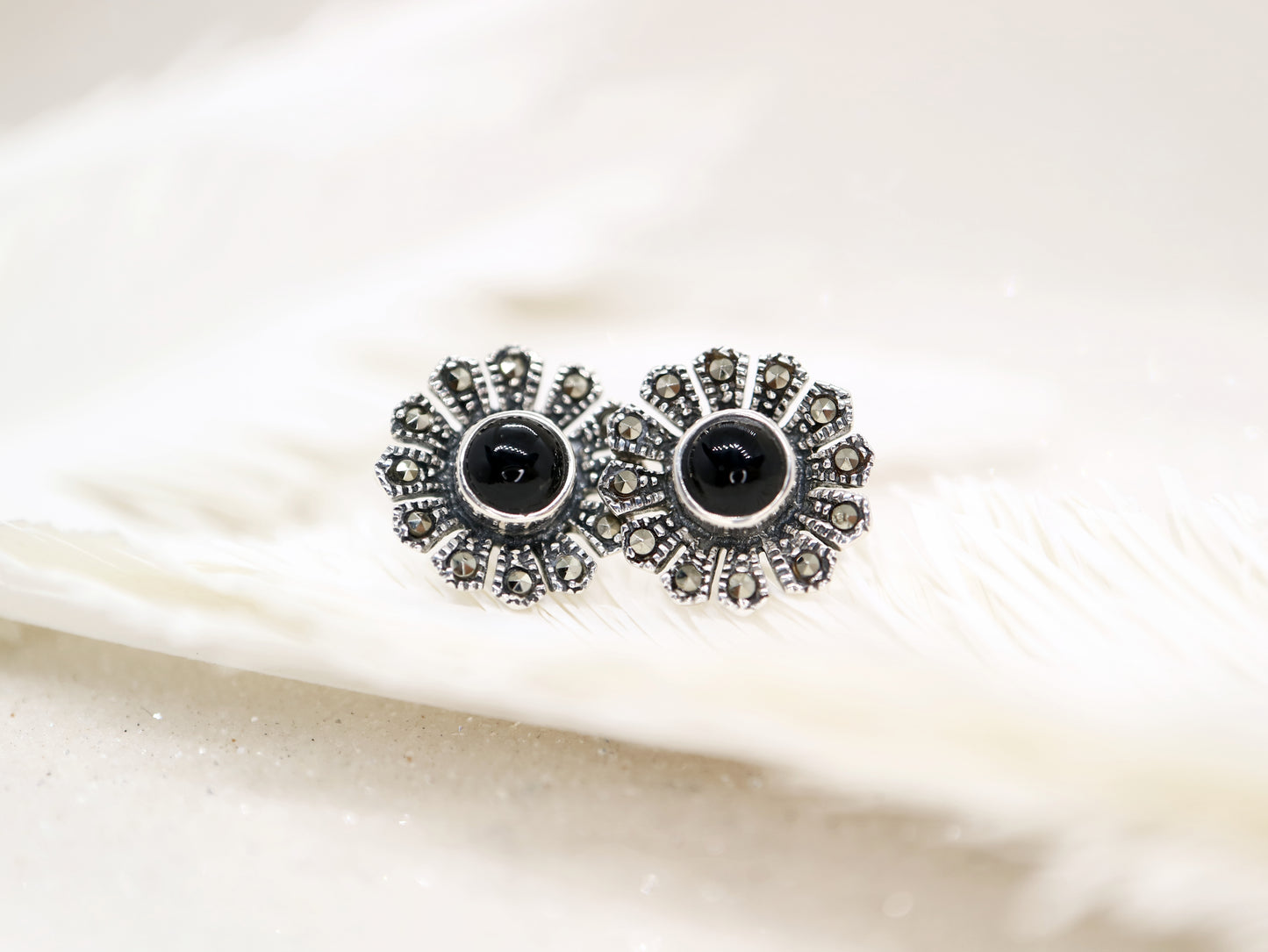 Black onyx and marcasite flower earrings in sterling silver