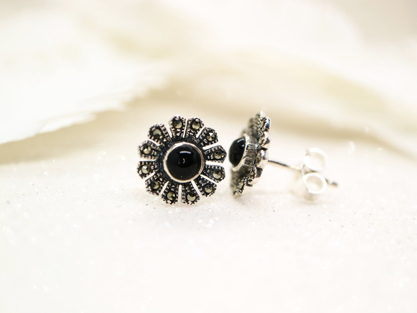 Black onyx and marcasite flower earrings in sterling silver