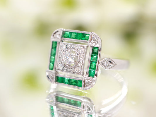 Art deco emerald ring in square channel set design