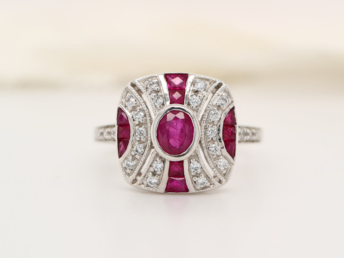 Art deco ruby ring in classic cushion design