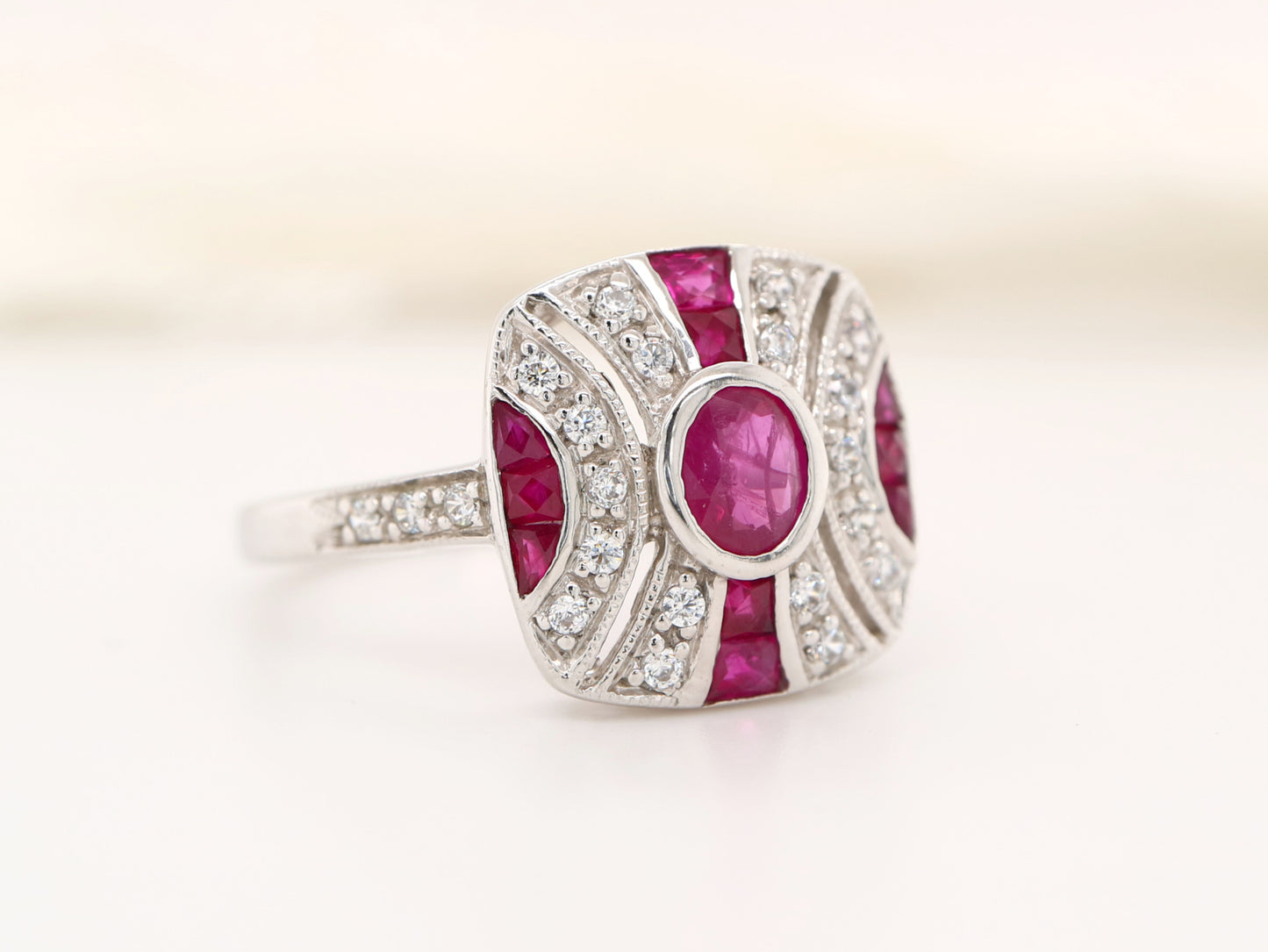 Art deco ruby ring in classic cushion design