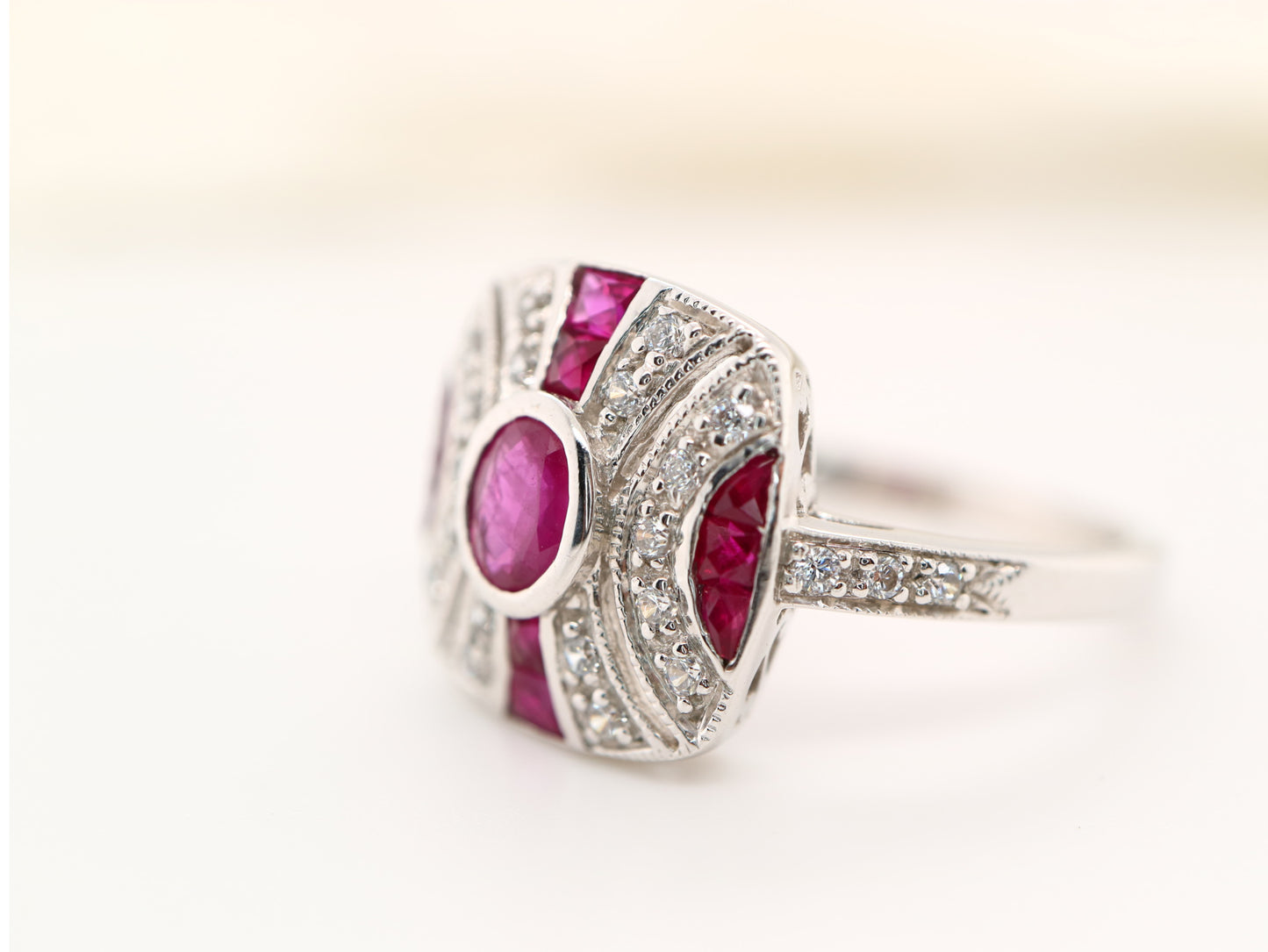 Art deco ruby ring in classic cushion design