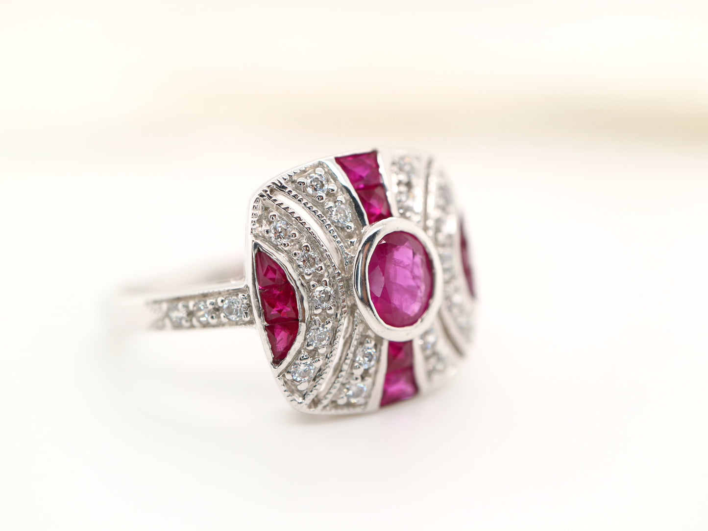 Art deco ruby ring in classic cushion design