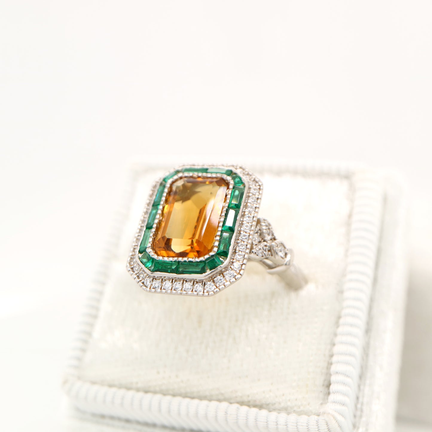 Art Deco style channel set ring with citrine and emerald