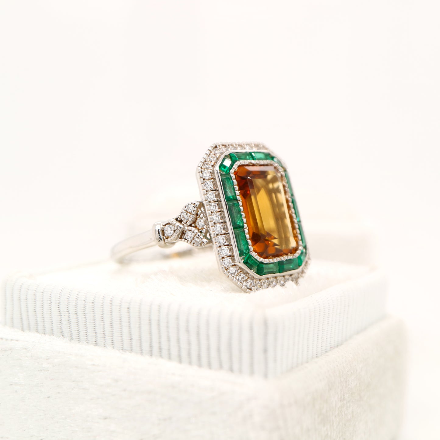 Art Deco style channel set ring with citrine and emerald