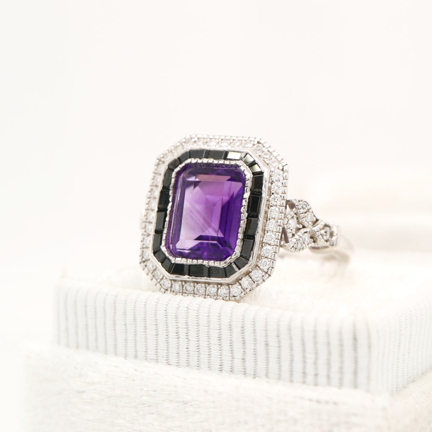 Art deco style amethyst ring with black onyx channel set halo