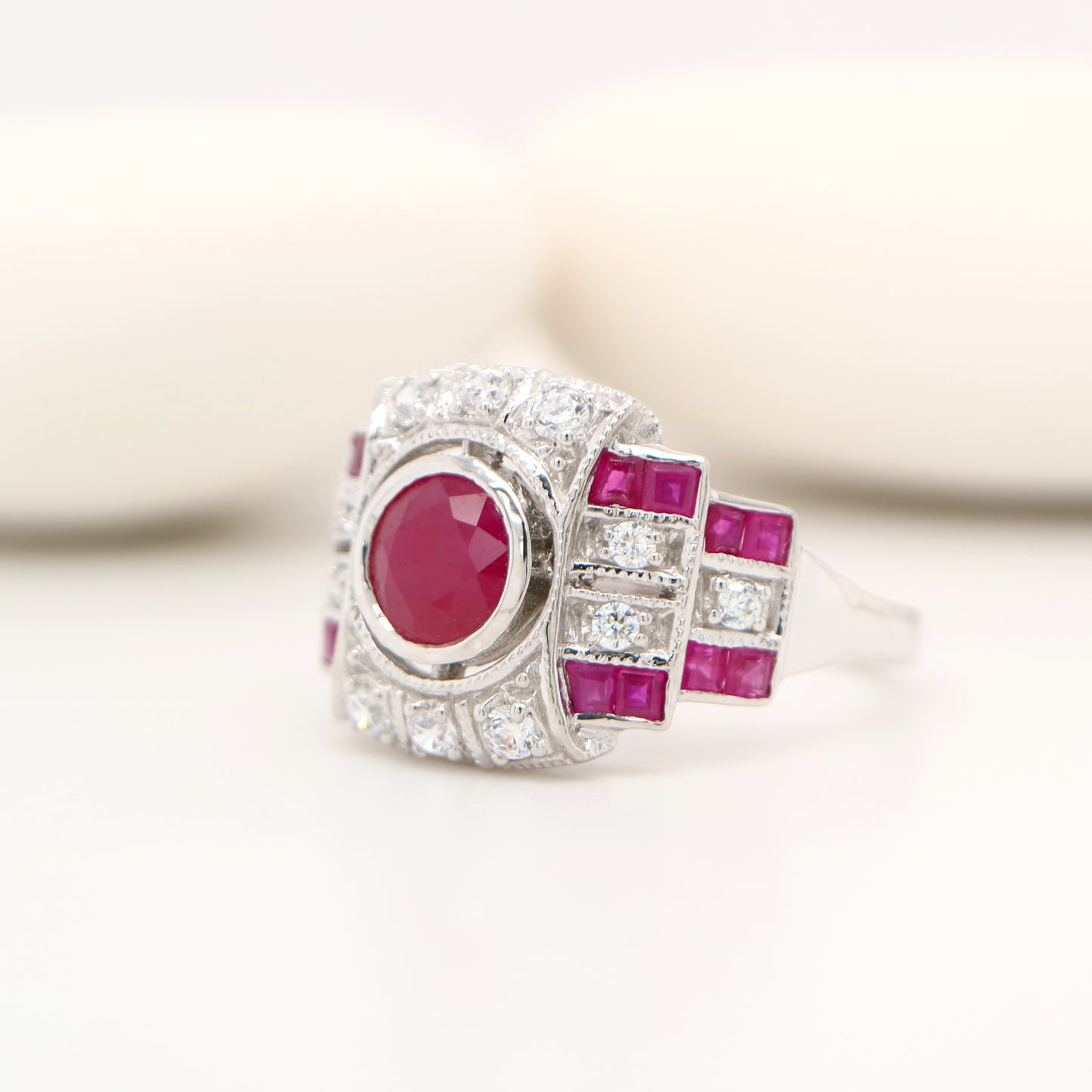 Art deco ruby ring with French cut rubies and diamonds