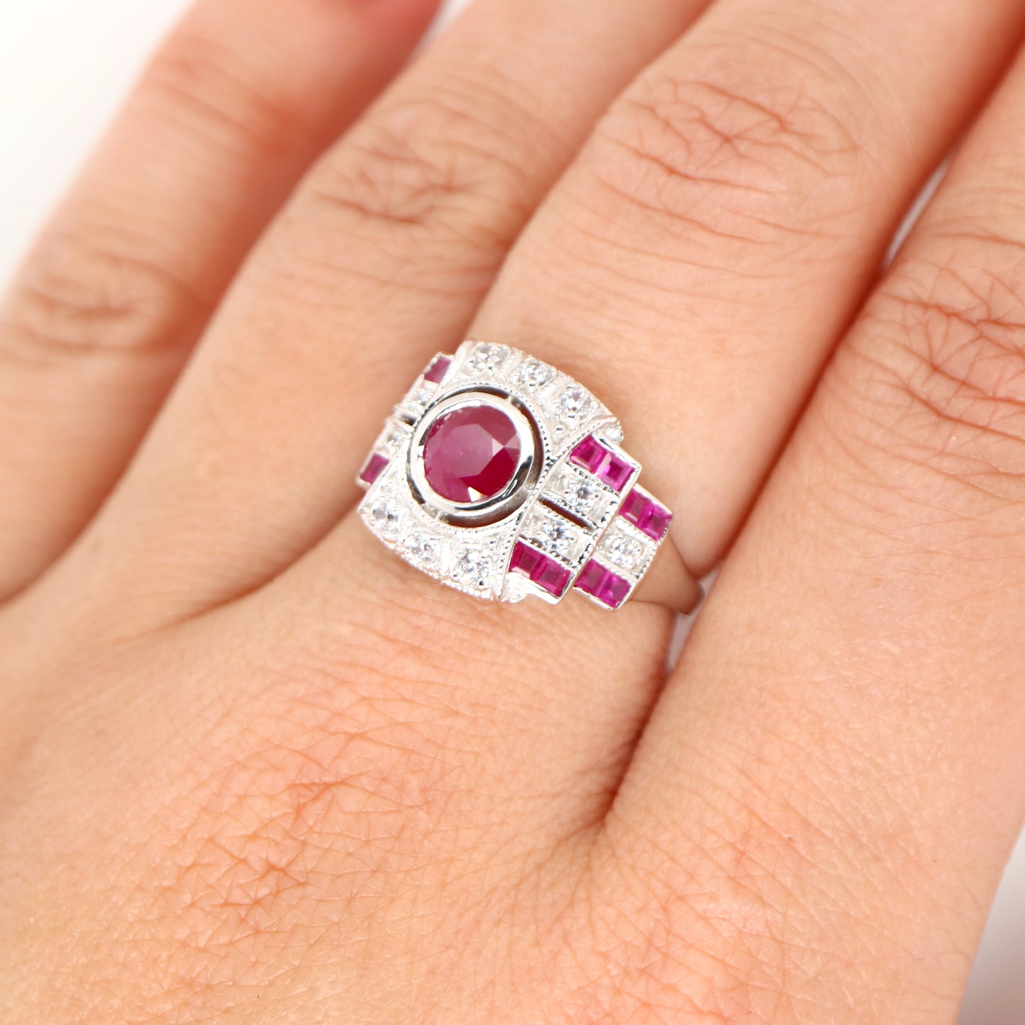 Art deco ruby ring with French cut rubies and diamonds