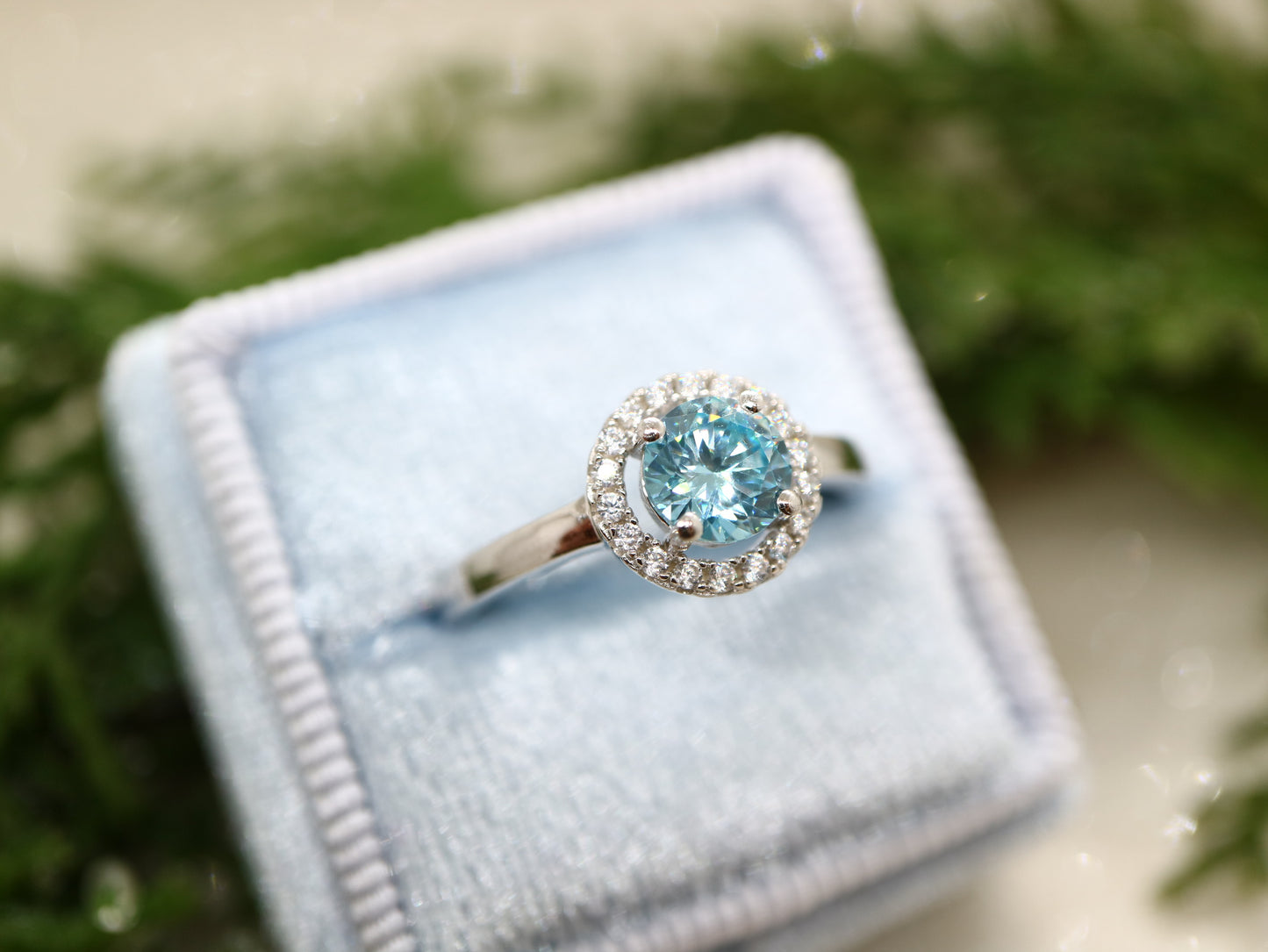 Blue topaz classic halo ring