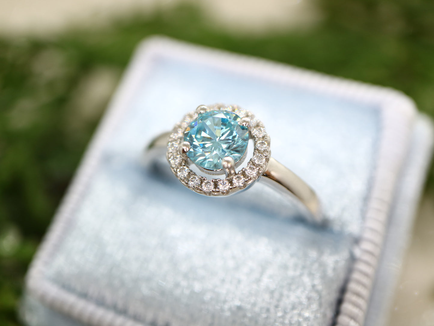 Blue topaz classic halo ring