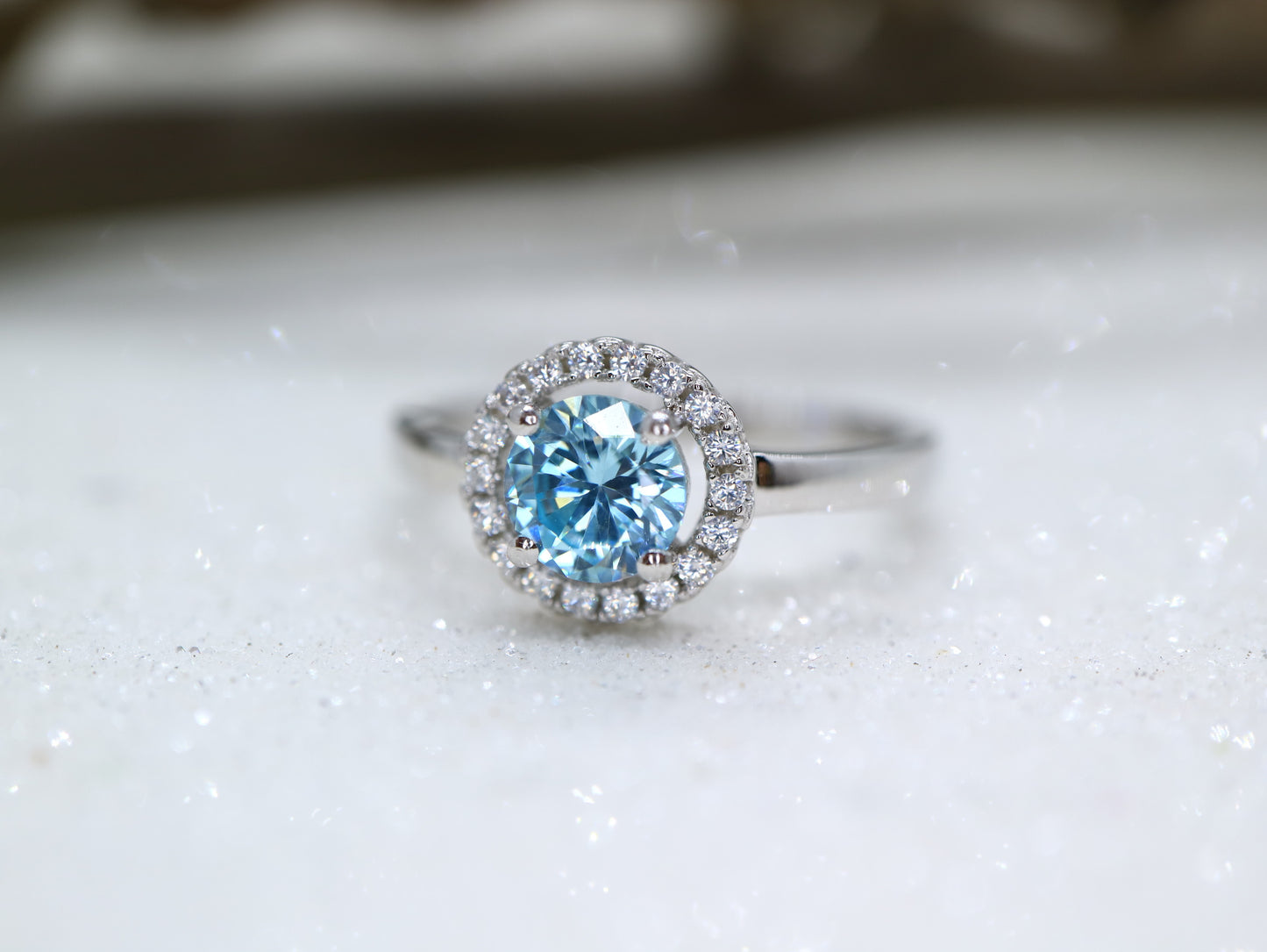 Blue topaz classic halo ring