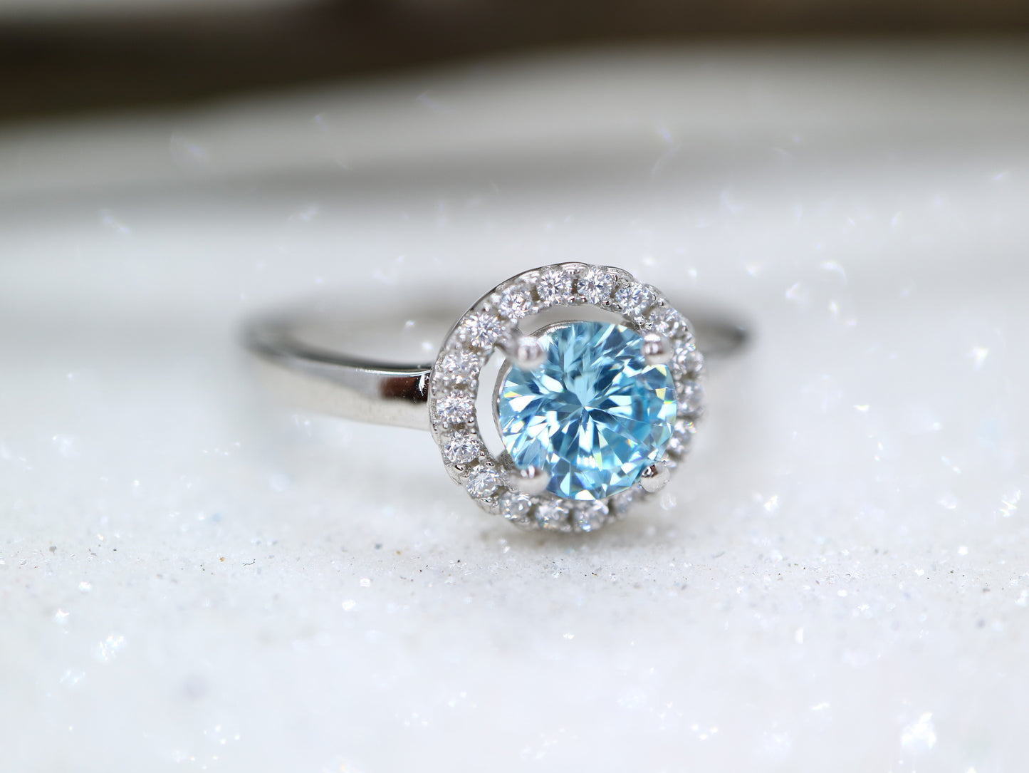 Blue topaz classic halo ring