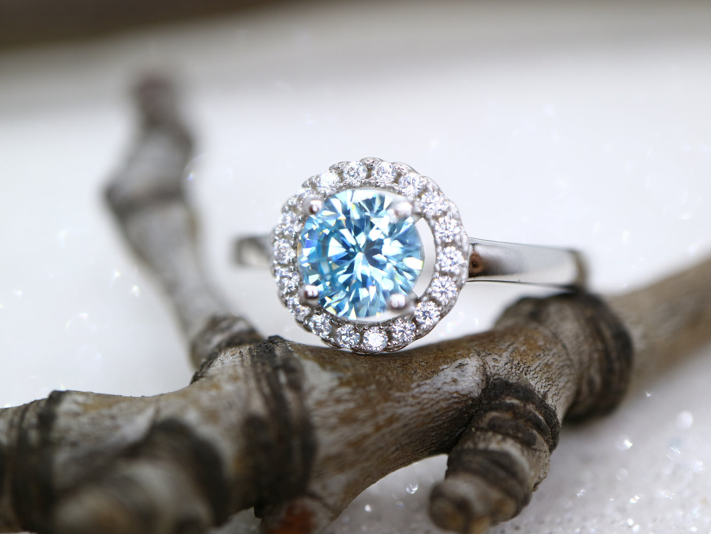 Blue topaz classic halo ring