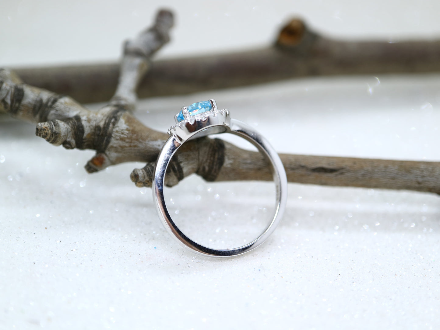 Blue topaz classic halo ring