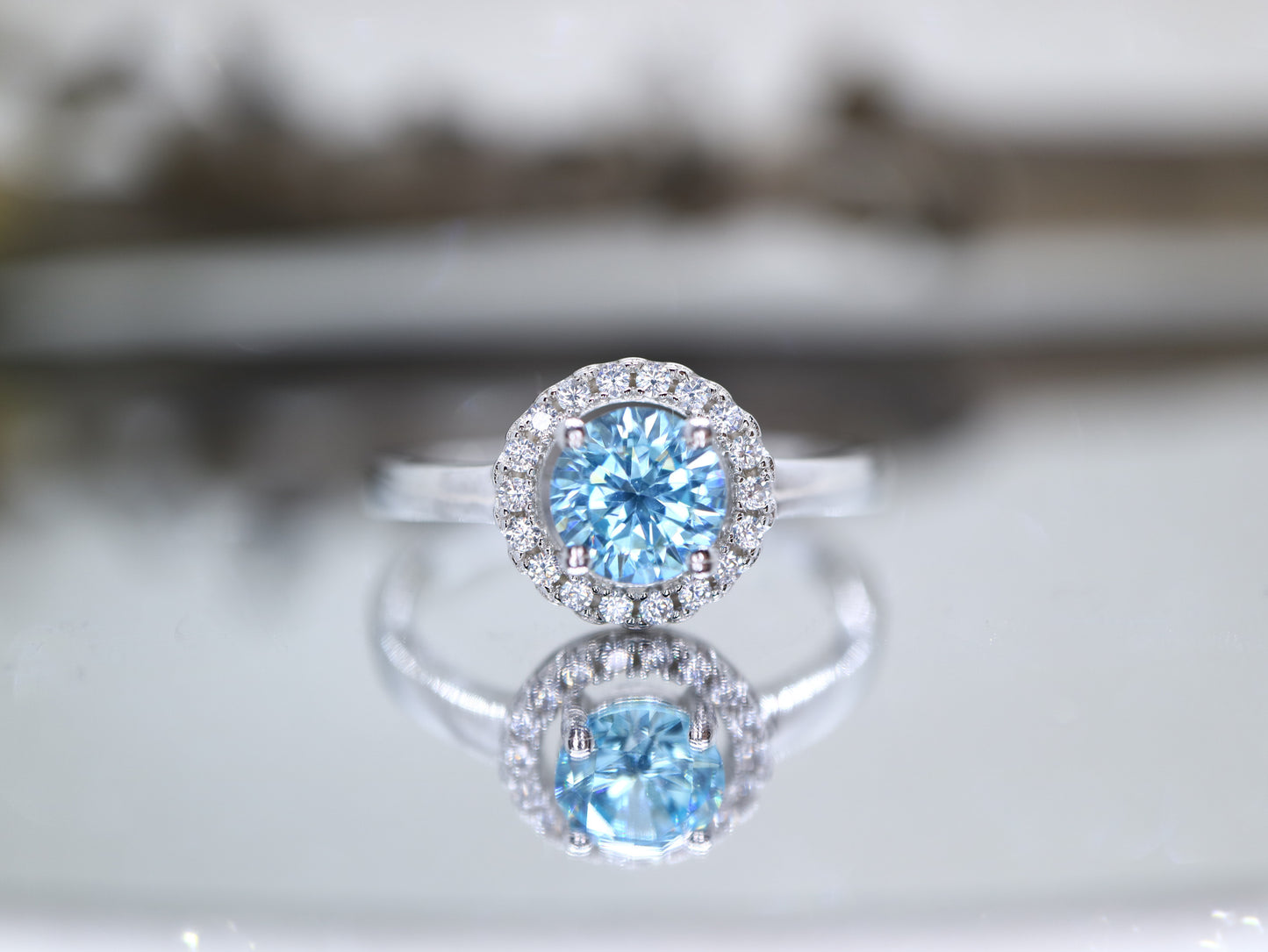 Blue topaz classic halo ring