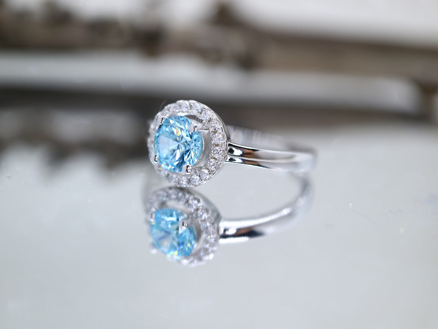 Blue topaz classic halo ring