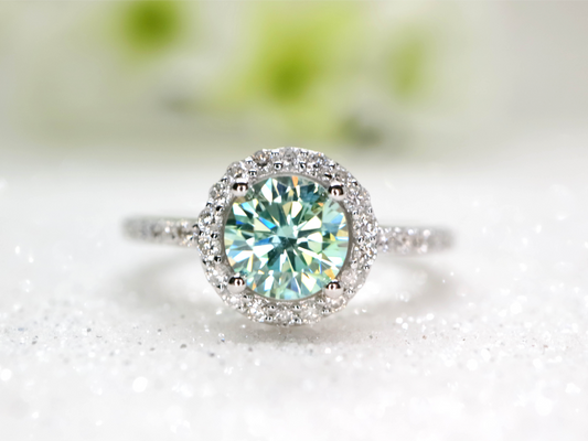 Minty green moissanite and diamond halo ring