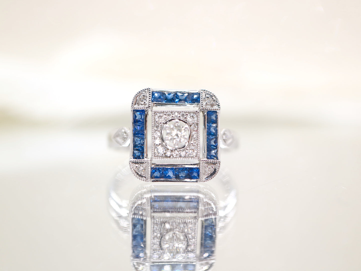 Art deco sapphire ring in square channel set design