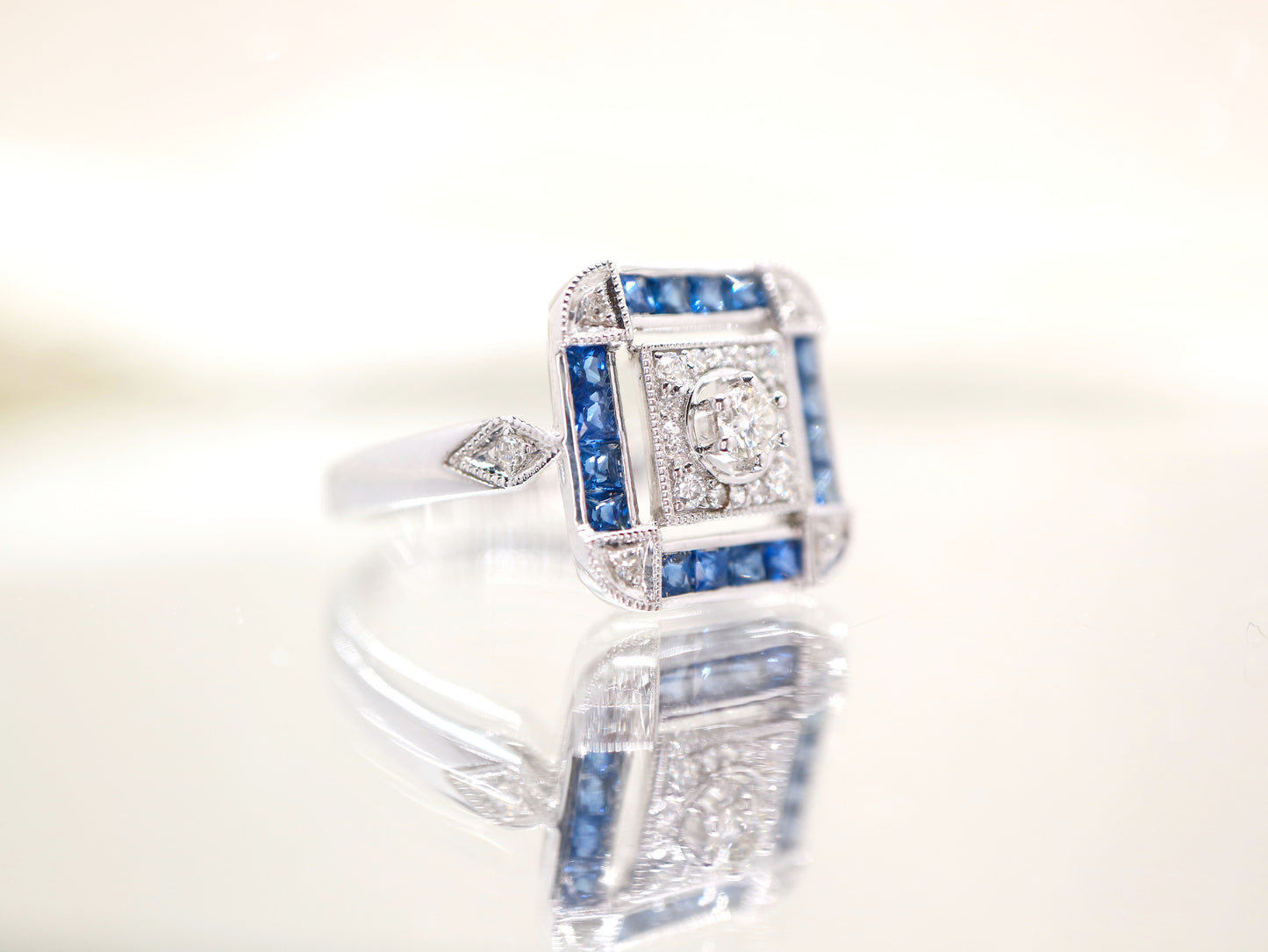 Art deco sapphire ring in square channel set design