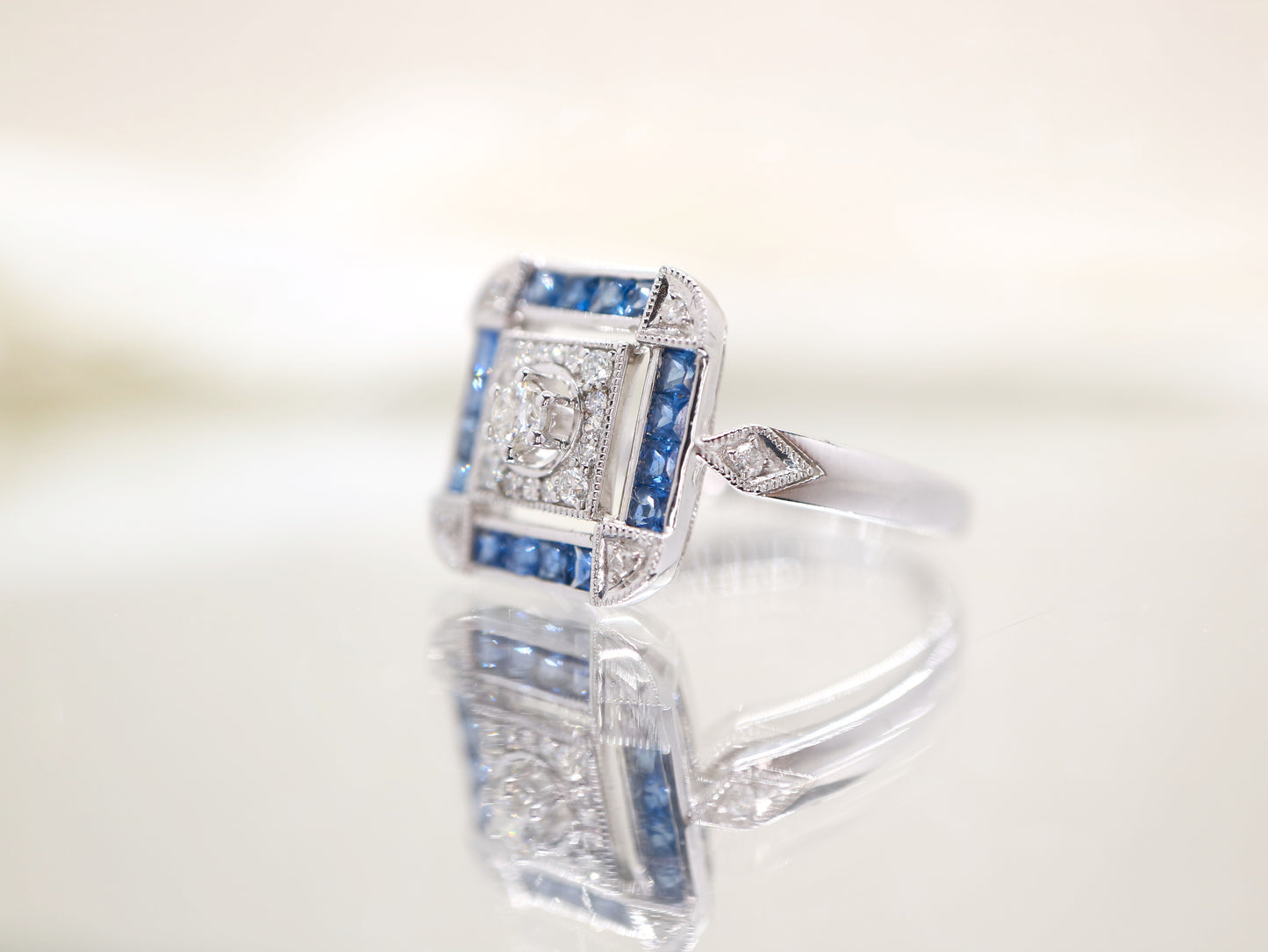 Art deco sapphire ring in square channel set design