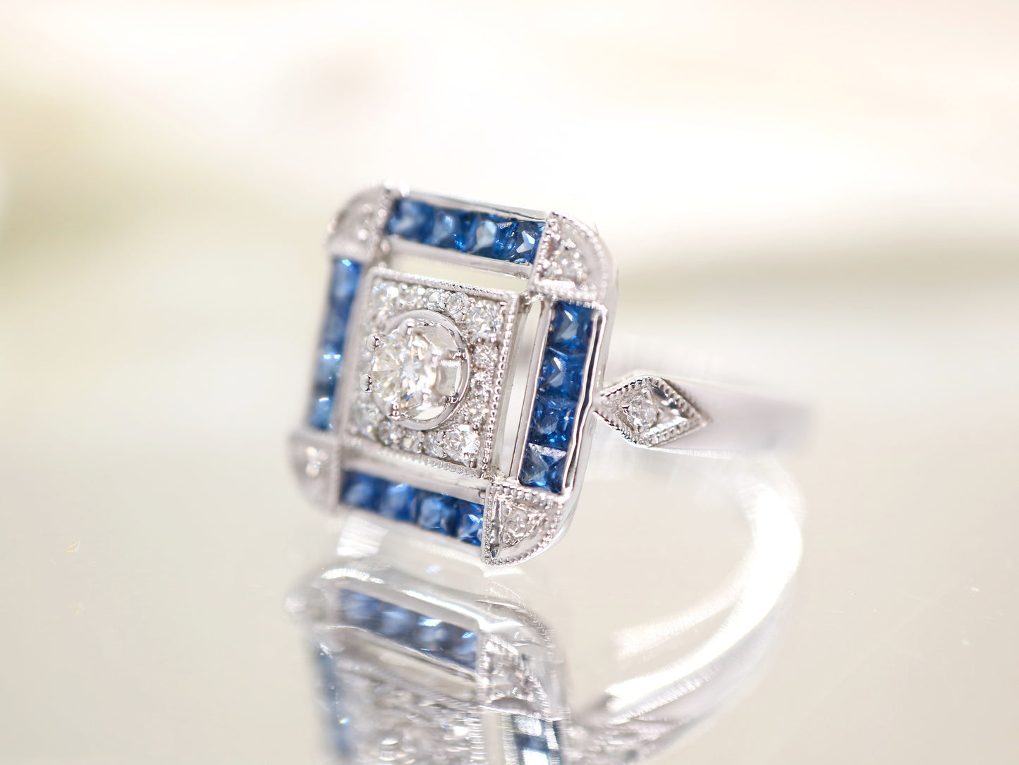 Art deco sapphire ring in square channel set design