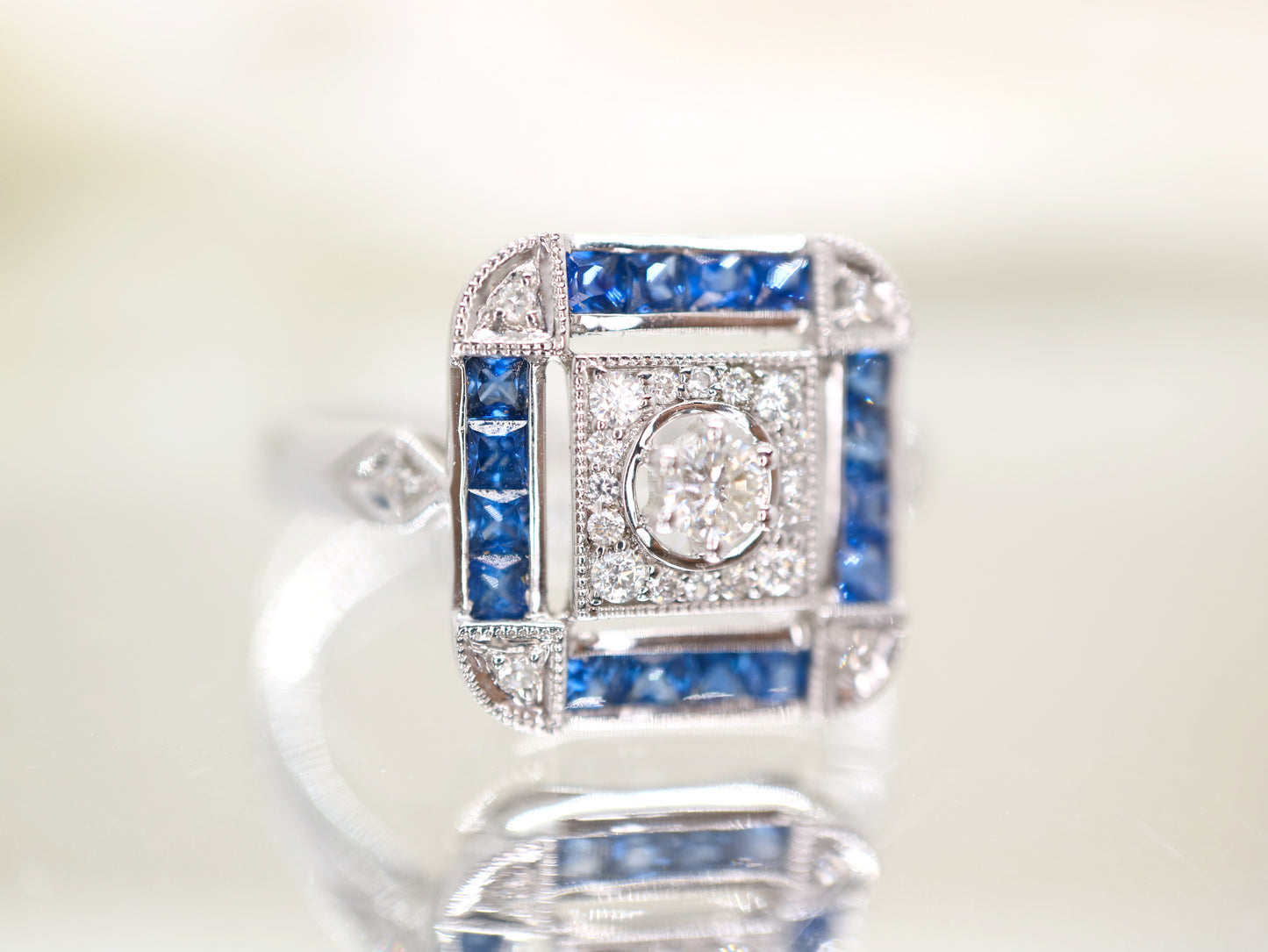 Art deco sapphire ring in square channel set design