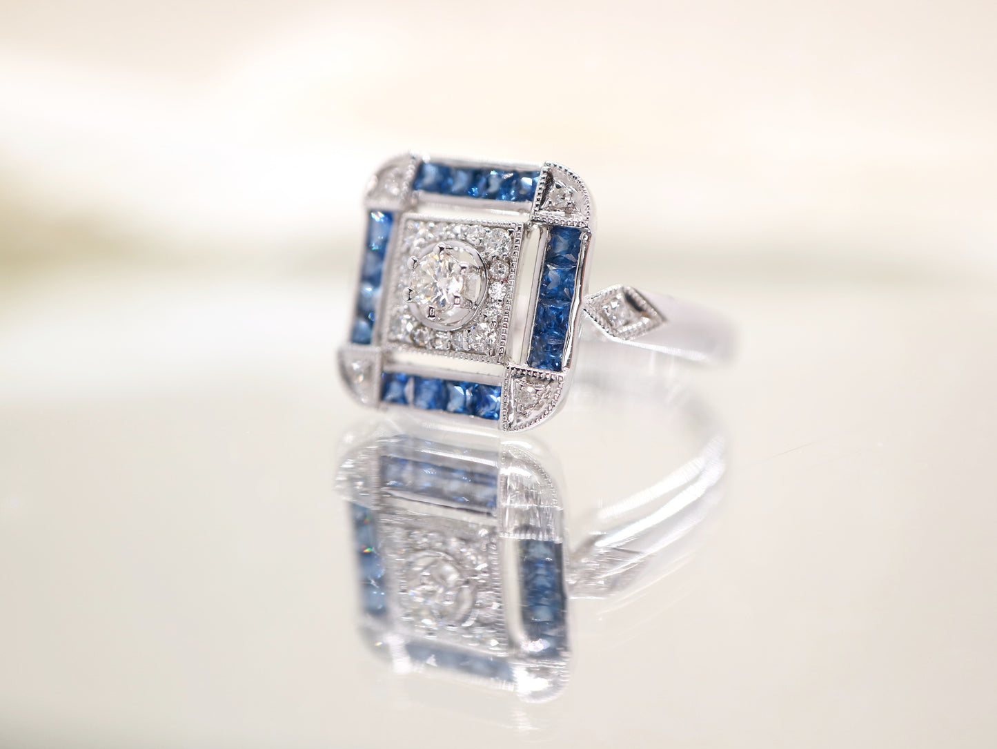 Art deco sapphire ring in square channel set design