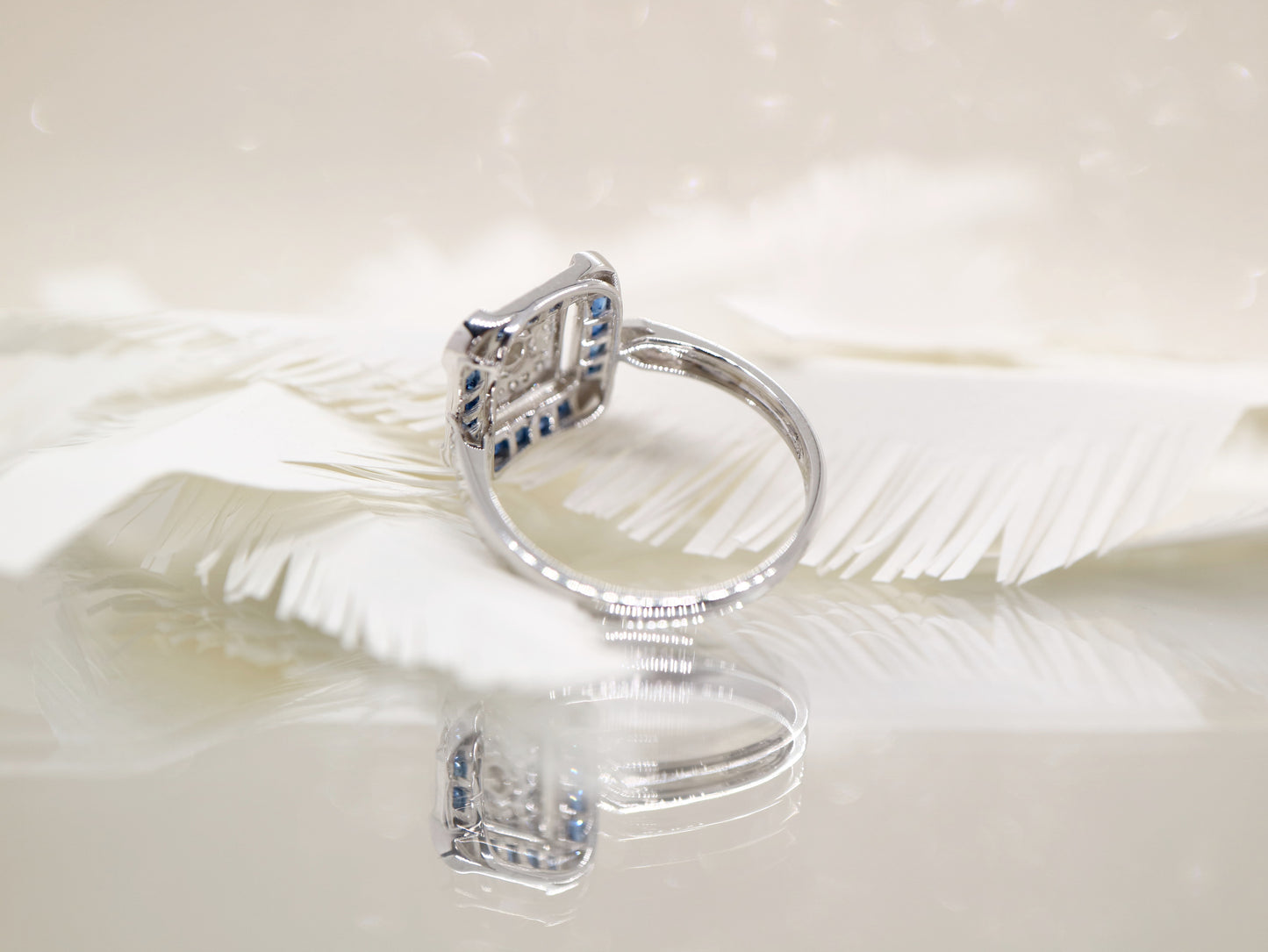 Art deco sapphire ring in square channel set design