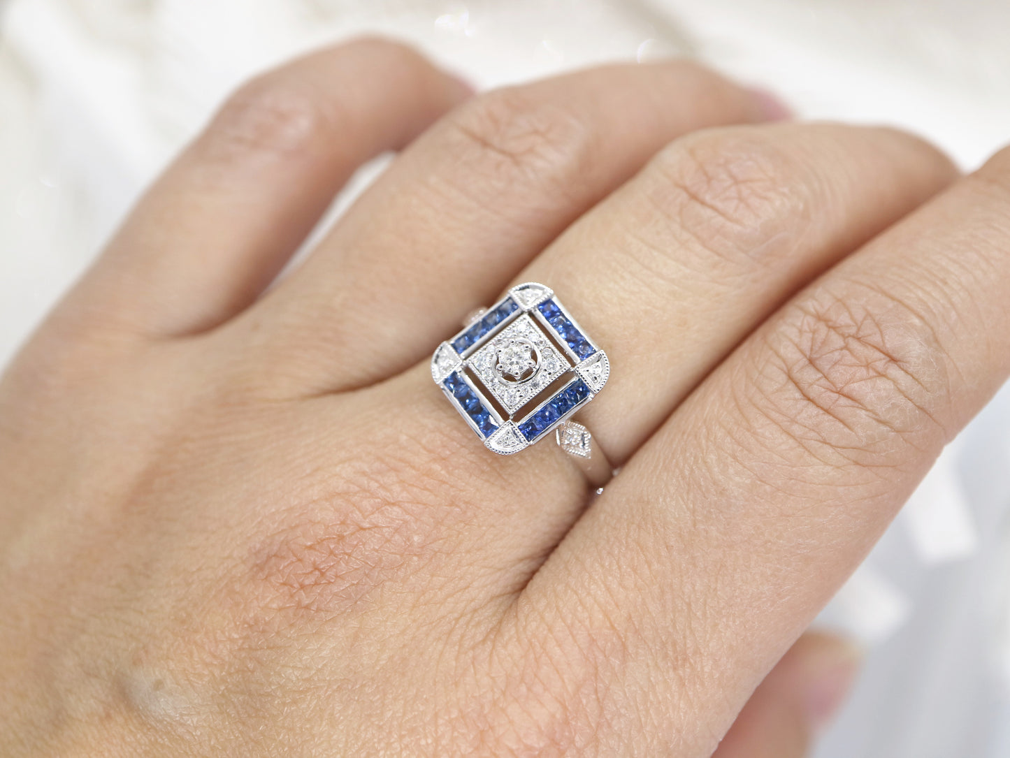 Art deco sapphire ring in square channel set design